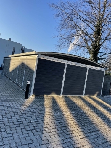 Tømrer udfører totalentreprise med montering af carport og overdækning med facadebeklædning